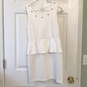 White peplum dress with gold accents